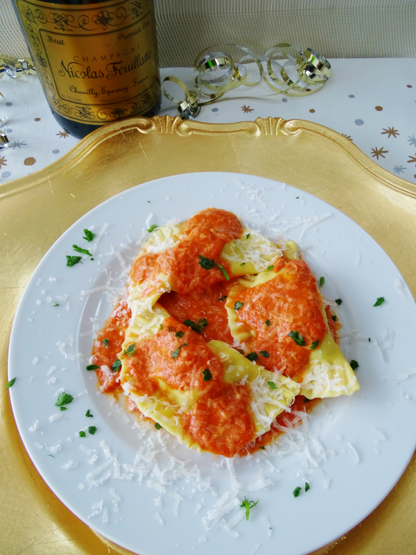 shrimp and lobster ravioli with tomato cream sauce